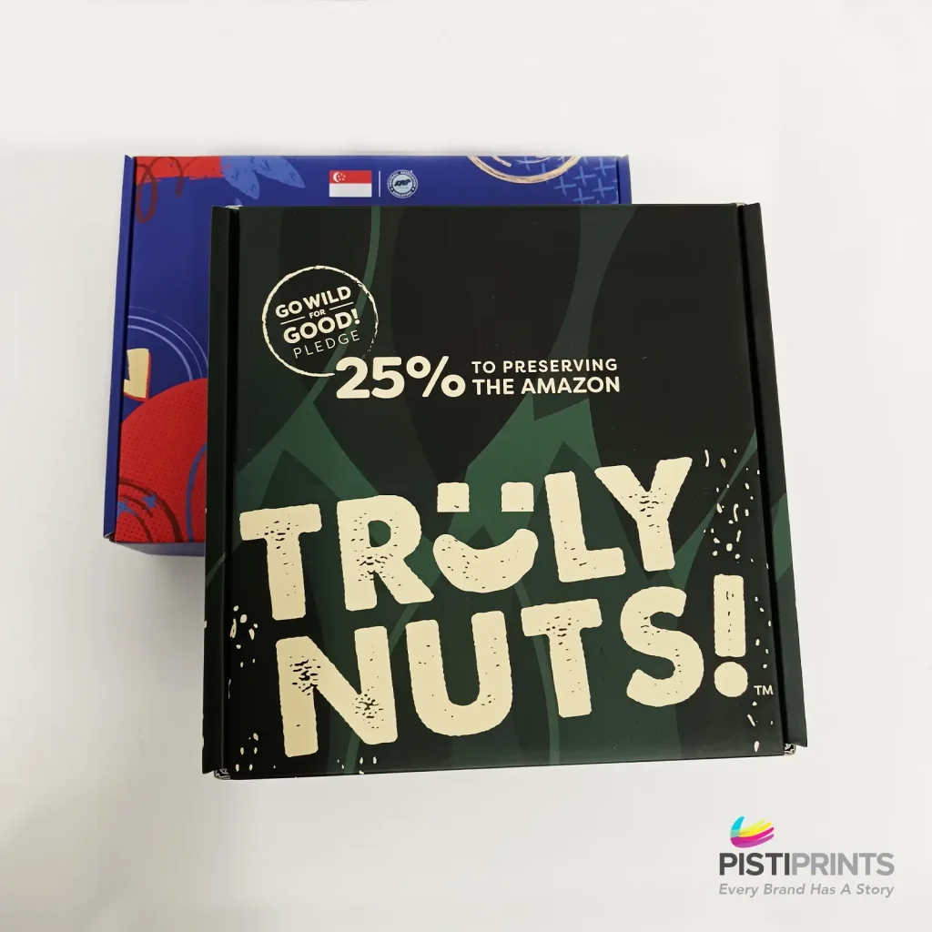 Colorful custom printed boxes with bold design and eco-friendly message — great for business packaging in Singapore.
