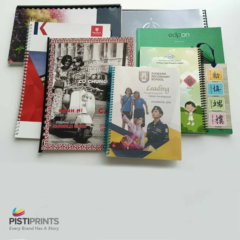 Collection of printed booklets with different formats, binding styles, and cover designs, showcasing booklet printing options and finishing services in Singapore.