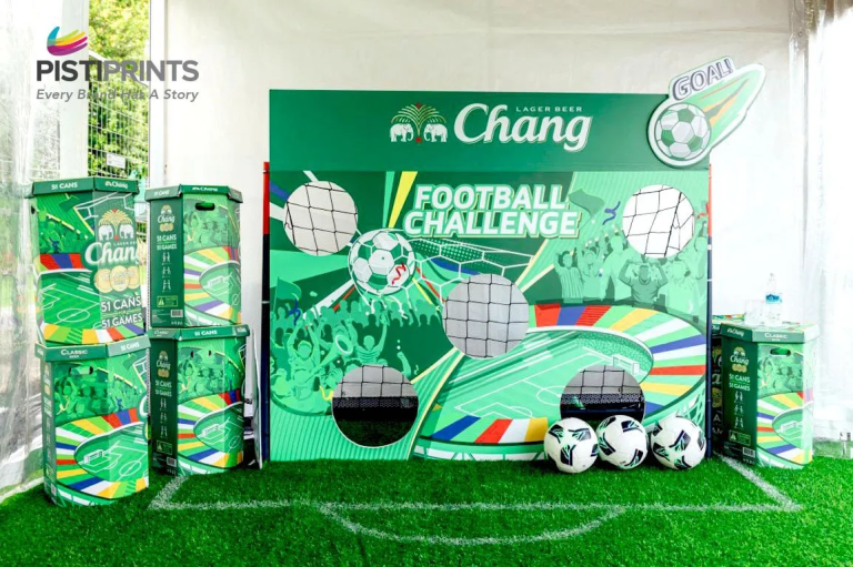 Foam board printing display for Chang Beer Football Challenge at an event in Singapore, featuring vibrant graphics, cut-out targets, and promotional branding.